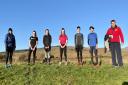 Some of the top young sprinters from Helensburgh AAC’s ranks pause during a socially-distanced training session before Christmas in the hills above the town