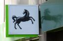Lloyds Banking Group has seen its profits drop by more than a quarter in recent months (Stefan Rousseau/PA)