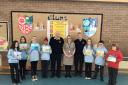The children of Colgrain Primary were happy to receive their new books