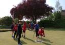 Fifty P7 pupils try their hands at bowls at Helensburgh Bowling Club