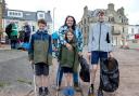 Jamie McPherson with Sophie, Hamish and Angus Ritchie. Jamie and Angus are helping with the beach clean as part of their Scouting Gold award.