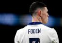 The St George's Cross graphic on the back of Phil Foden's shirt during England's friendly match against Brazil