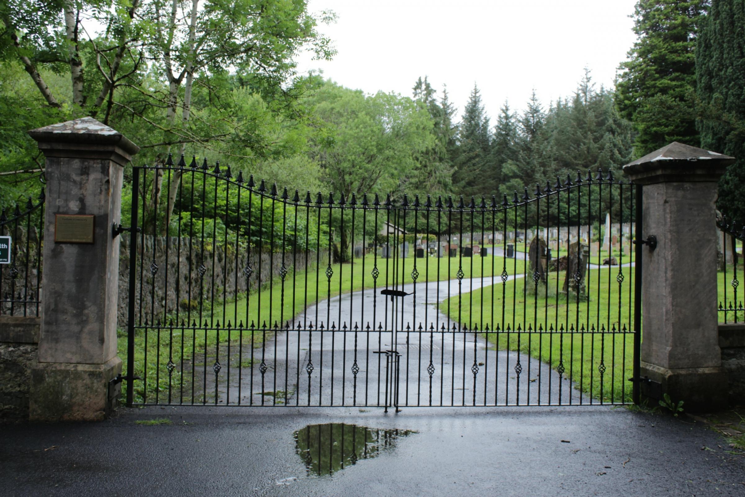 The new gates at the entrance to Faslane Cemetery - and the pillars on either side which have also been restored as part of the refurbishment project (Image: Stella Irving)