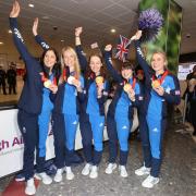 Team GB's women's curlers arrive home after their gold medal triumph at the Winter Olympics (Steve Welsh/PA Wire)