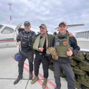 Ewen Cameron and Craig Borthwick evacuating Shareef Amin, a UK fighter who suffered serious injuries after a Russian bomb attack in Odesa