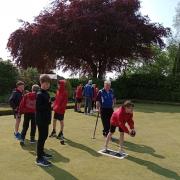 Fifty P7 pupils try their hands at bowls at Helensburgh Bowling Club