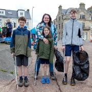 Jamie McPherson with Sophie, Hamish and Angus Ritchie. Jamie and Angus are helping with the beach clean as part of their Scouting Gold award.