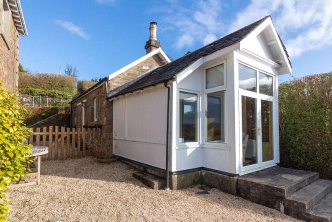 The property comes with its own detached cottage