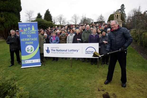 Helensburgh Advertiser: Chris Packard cuts the first sod of turf to mark the start of Hermitage Park's regeneration