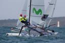 Anna Burnet and John Gimson will go for gold in the Nacra 17 class at the Tokyo Olympics on Tuesday