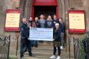 Helensburgh and District Round Table presents a cheque to The Tower