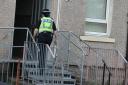 Royal Navy bomb disposal experts from Faslane were called to the flat in Altyre Street in Shettletson