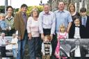 Archie McNeilage with his family after the 75-year-old's final trip as a taxi driver before retirement in 2008