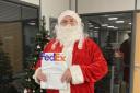 David Walker has been dressing up as Santa for the week before Christmas