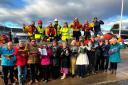 Members of the RNLI and the choir celebrated the announcement