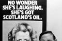 Gordon Wilson with a 'Scotland's oil' poster, part of a new SNP campaign launched in September 1980