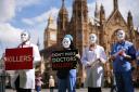 Campaigners protest outside Westminster ahead of a debate in the House of Commons on assisted dying