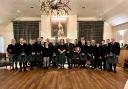 Helensburgh Clan Colquhoun Pipe Band members and guests with Sir Malcolm and Lady Colquhoun at Loch Lomond Arms Hotel