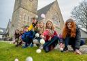 Children rolled Easter eggs at the church's Easter service