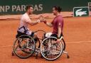 Alfie Hewett and Gordon Reid in action in the 2022 French Open men's wheelchair doubles final