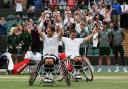 Alfie Hewett and Gordon Reid celebrate their doubles triumph at Wimbledon in July - their 18th Grand Slam title together
