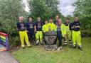 Engineers donned hi vis clothes as they got to work in the garden