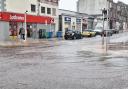 Sinclair Street at the intersection with East and West Princes Street was under water early Saturday