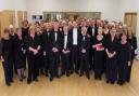 The choir pictured before a performance earlier this year