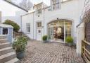 The former coach house is now a charming family home