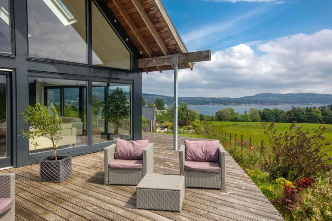 The decking offers views over the Gareloch towards Helensburgh and beyond