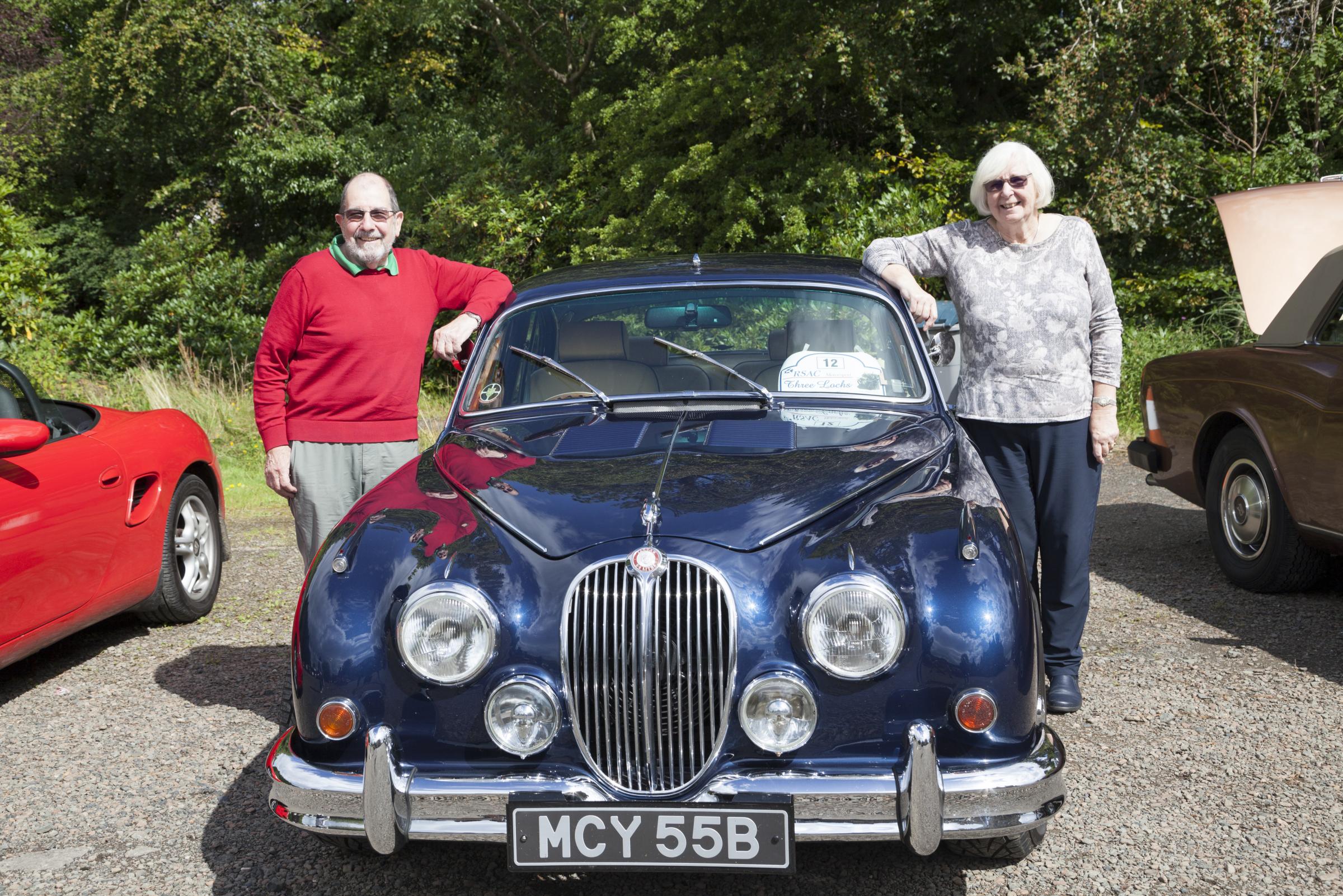 Gordon and Isobel Calder from Helensburgh show off their 1965 Jaguar Mk2