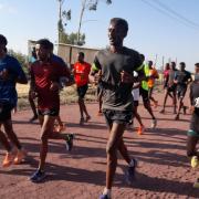 Weynay Ghebresilassie, seen here (in the grey T-shirt on the right) training in Ethiopia is set to return to Helensburgh for the Babcock 10K series in May (Photo - Daren Borzynski)
