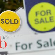 File photo dated 14/10/14 of a sold and for sale signs. The average UK house price was £33,000 higher in October than a year earlier, after jumping by 12.6%, according to official figures. The annual rate of change in October accelerated from a