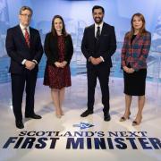 STV hosted a televised debate with the three contenders to be First Minister on Tuesday - STV political editor Colin Mackay is pictured with Kate Forbes, Humza Yousaf and Ash Regan (Image: STV/PA)
