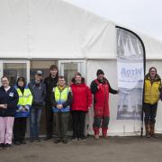 Autism on the Water members and volunteers with members of Coast Watch at Rhu Marina (Photo: Ann Stewart)