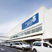 Are there any pick-up or parking charges at Glasgow Airport?