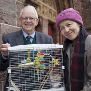 Richard and Ji Smith with their budgerigars.