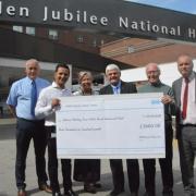 Hugh Galloway, second from right, was saved by a team at the NHS Golden Jubilee