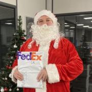 David Walker has been dressing up as Santa for the week before Christmas