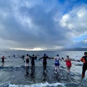 People braved the cold water on January 1