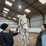 Volunteers Louise and Caroline have fun at a riding session
