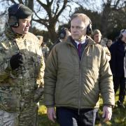 General Patrick Sanders (left), pictured speaking with UK defence secretary Grant Shapps in November, has warned that a ‘citizens’ army’ may be needed to protect the country from global security threats (Image: PA)