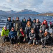 Members of Musicians in Exile with National Park Rangers at Milarrochy Bay, Loch Lomond