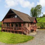 The chalet sits on around 1.5 acres of land