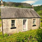 The property is located in a tranquil village on the loch