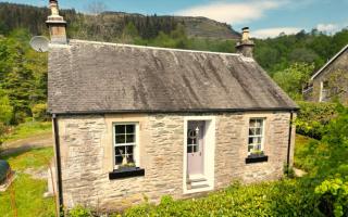 The property is located in a tranquil village on the loch