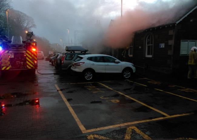 Smoke can be seen billowing from the station building at Cardross railway station as firefighters tackle Tuesday morning's blaze (Pic - @ScotRail on Twitter)